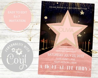 May include: A pink and gold star-shaped invitation with the text "You are invited to a birthday party for Olivia" and "A Night at the Emmys". The invitation is for a first birthday party and includes the date, time, and location.