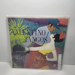 May include: Vintage vinyl record album titled "The Passionate Valentino Tangos." The album cover features a colorful illustration of a man in a hat dancing with a woman. The artist's name, Francisco Gazador, is also printed on the cover.