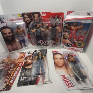 Mattel Figuras de acción de la WWE, figura de Cody Rhodes Elite de la WWE  con accesorios, coleccionable