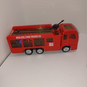 WolVol Firetruck  Fire Engine 3D Lighting Effects Sounds Lights Sirens 3D Works Great Shape - Firetruck - Pretend Play - Toy Firetruck