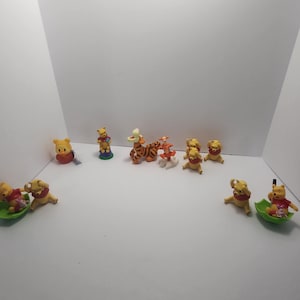 Bonecos do Ursinho Pooh - Bisonho - Tigrão - Pooh - Disney - Brinquedos Disney - Brinquedos Mattel - Brinquedos do Ursinho Pooh - Bisonho - Topos de Bolo