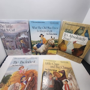 May include: A collection of children's books by Hans Christian Andersen. The covers feature illustrations of scenes from the stories, including "The Little Match Girl," "What The Old Man Docs Is Always Right," and "It's Absolutely True!"
