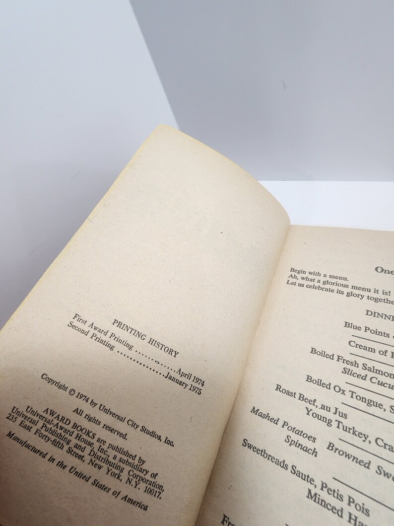 May include: A close-up of a book's copyright and printing history page. The text includes the copyright year, publisher, and printing dates. The page is printed on white paper with black ink.