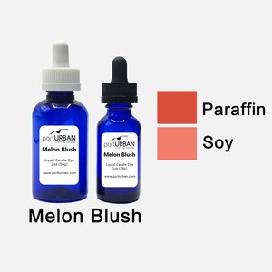 May include: Two blue bottles with droppers labeled "portURBAN Melon Blush Liquid Candle Dye 2oz (56g) www.porturban.com" and "portURBAN Melon Blush Liquid Candle Dye 1oz (28g) www.porturban.com".  The bottles are next to two color swatches labeled "Paraffin" and "Soy".