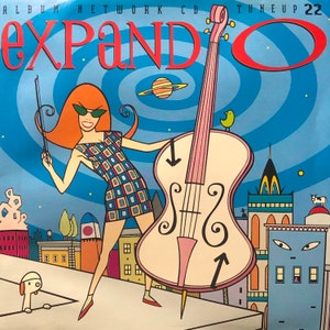 May include: A colorful illustration of a woman playing a large pink cello in a city setting. The woman is wearing a checkered dress and sunglasses. The cello is in the foreground and the city is in the background. The text "EXPAND-O" is in large red letters at the top of the image.