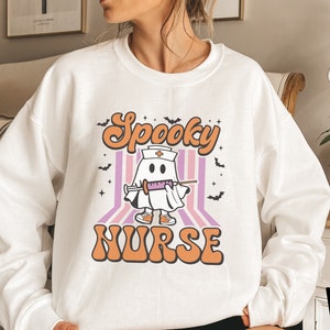 Halloween Nurse Sweatshirt, Spooky Nurse Sweatshirt, Nurse Halloween Gifts, Halloween Party Shirt, Nurse Halloween T-shirt,Registered Nurse image 1