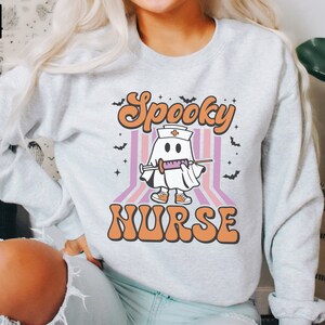 Halloween Nurse Sweatshirt, Spooky Nurse Sweatshirt, Nurse Halloween Gifts, Halloween Party Shirt, Nurse Halloween T-shirt,Registered Nurse image 7