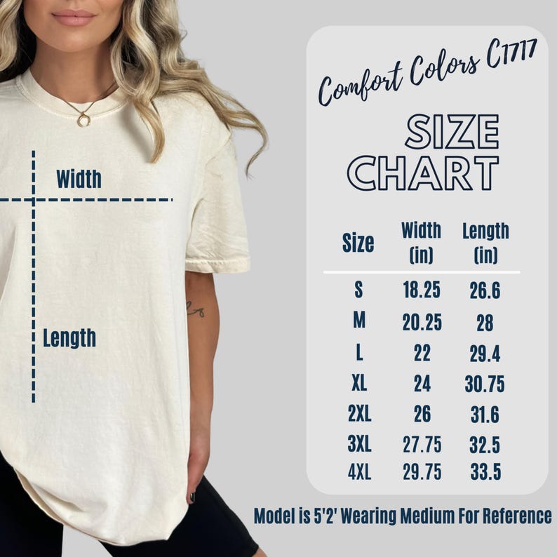 May include: Cream-colored t-shirt with a size chart. The chart lists sizes S to 4XL, with width and length measurements in inches. The text "Comfort Colors C1717" is at the top. The model is wearing a medium size.