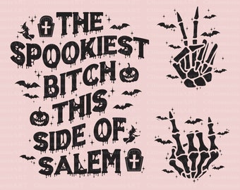 May include: Black graphic design on a light pink background. The text reads "THE SPOOKIEST BITCH THIS SIDE OF SALEM" with Halloween-themed illustrations, including bats, pumpkins, witch, and a skeleton hand making a peace sign.