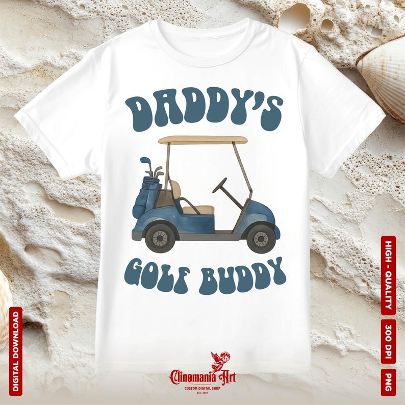 May include: White t-shirt featuring a blue golf cart graphic with the text "DADDY'S GOLF BUDDY" in a retro font. The golf cart is blue with a tan roof and includes golf clubs. The shirt is a digital download.