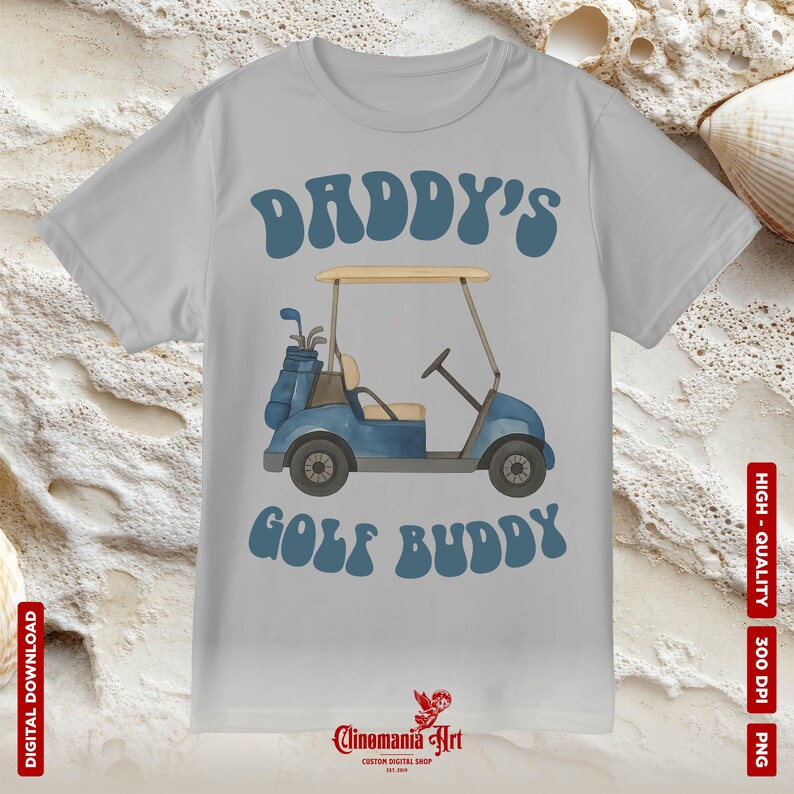 May include: A light gray t-shirt with the text "DADDY'S GOLF BUDDY" in blue. The design features a blue golf cart with golf clubs. The shirt is a digital download.