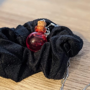 Blood vial necklace