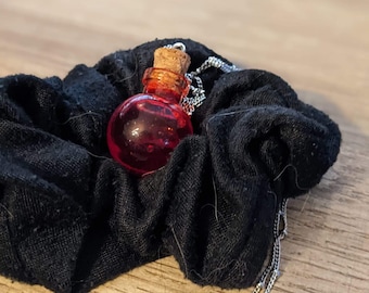 Blood vial necklace