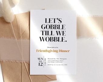 May include: A white card with black text that reads "Let's Gobble Till We Wobble." The card is a Friendsgiving dinner invitation with the date "Sun Nov 12". The card is on a brown envelope with a white ribbon and dried flowers.