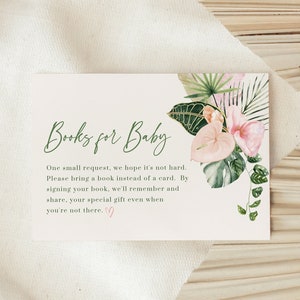 May include: A white card with green text that reads "Books for Baby". The card has a tropical floral design with pink flowers and green leaves. The text on the card reads: "One small request, we hope it's not hard. Please bring a book instead of a card. By signing your book, we'll remember and share, your special gift even when you're not there."