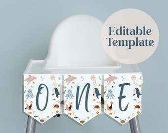 May include: A white high chair with a blue and white banner that says "ONE" with an ocean animal theme. The banner is decorated with sea creatures like jellyfish, seahorses, and fish. The text "Editable Template" is on a pink circle.