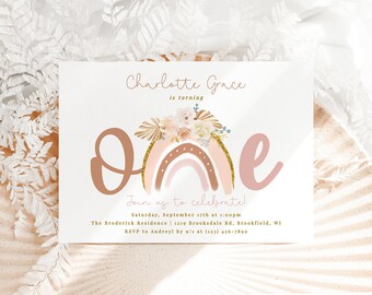 May include: A pink and brown illustrated invitation for a first birthday party. The invitation features a rainbow with a floral crown and the number "one" in a pink and brown font. The text reads "Charlotte Grace is turning one. Join us to celebrate! Saturday, September 17th at 1:00pm. The Broderick Residence | 1219 Brooksdale Rd, Brookfield, WI. RSVP to Audreyl by 9/1 at (123) 456-7890."