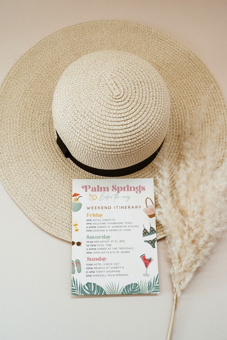 May include: A pink and green illustrated card with the text "Palm Springs Before the Rings Weekend Itinerary". The card lists a weekend itinerary for a wedding party with activities like champagne toast, dinner, pool time, and shopping.