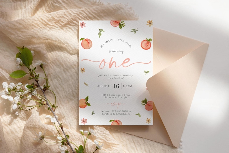 May include: Peach-themed first birthday party invitation with watercolor illustrations of peaches and flowers. The invitation reads "Our sweet little peach is turning one" and includes the date, time, and location of the party. RSVP information is also included.