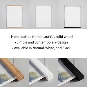 May include: Three blank white posters with wooden, white, and black magnetic hanging frames. The text reads: Hand-crafted from beautiful, solid wood. Simple and contemporary design. Available in Natural, White, and Black.