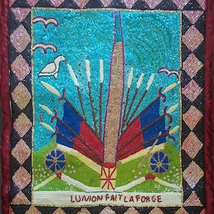 May include: A vibrant, beaded artwork featuring a central design with flags and spears, set against a turquoise background. The artwork includes the text "LUNION FAIT LA FORCE" and is framed with a black and pink diamond pattern.