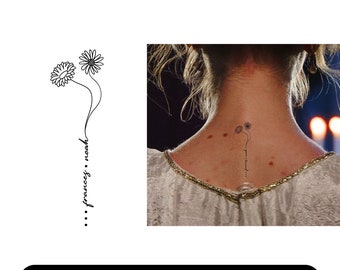 May include: A black and white line drawing of two flowers with the text "... frances . noah" below. The image is a tattoo design for a birth month flower and name.