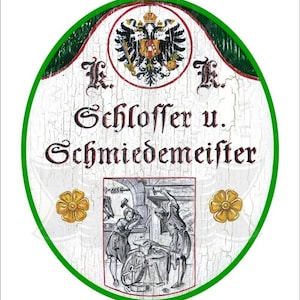 Puede incluir: Un letrero ovalado blanco con borde verde y un escudo de águila negra. El letrero dice "K. Schloffer u. Schmiedemeister" en letras negras.