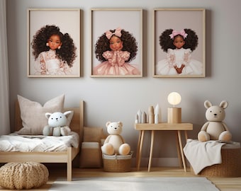 May include: Three framed illustrations of young girls with dark brown skin and curly black hair wearing white dresses with pink accents. The girls are smiling and looking at the viewer. The illustrations are set against a light gray wall in a child's bedroom.