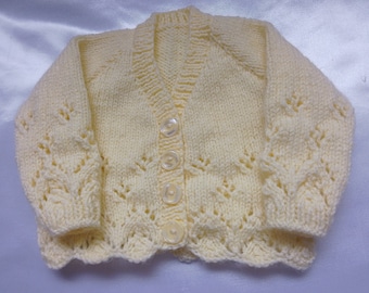 V neck baby cardigan in lemon with scalloped edge