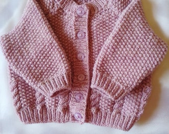 Round neck lilac baby cardigan.