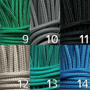 May include: Close-up of various colored braided cords. Colors include green, gray, black, beige, teal, and blue. Each cord is labeled with a number from 9 to 14. The cords are tightly woven and appear durable.