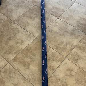 May include: A set of three white ceramic vases with a ribbed texture. The vases are different heights: approximately 25 cm, 20 cm, and 15 cm. The design is minimalist and modern.