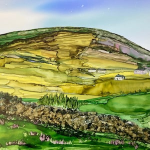 May include: An abstract landscape painting depicting a green hill and fields in shades of yellow and green. Small white buildings are dotted across the scene. A stone wall and purple flowers are in the foreground, with a blue sky above.
