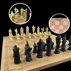 May include: A gold and black chess set with pieces arranged on a wooden board. The board is light brown and has a checkered pattern. The gold pieces are shaped like knights, bishops, rooks, queens, and kings. The black pieces are shaped like pawns.