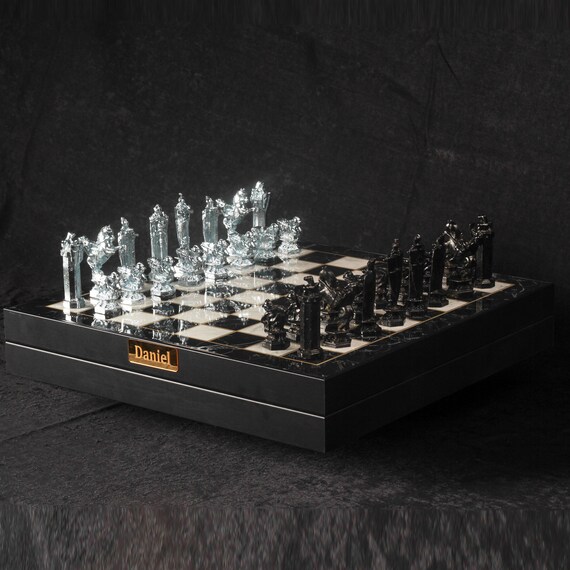 Premium Photo  Chess pieces on dark with red backlight close up