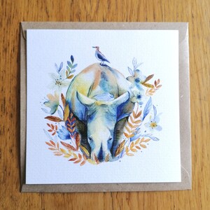 Carte postale Rhino et oiseau