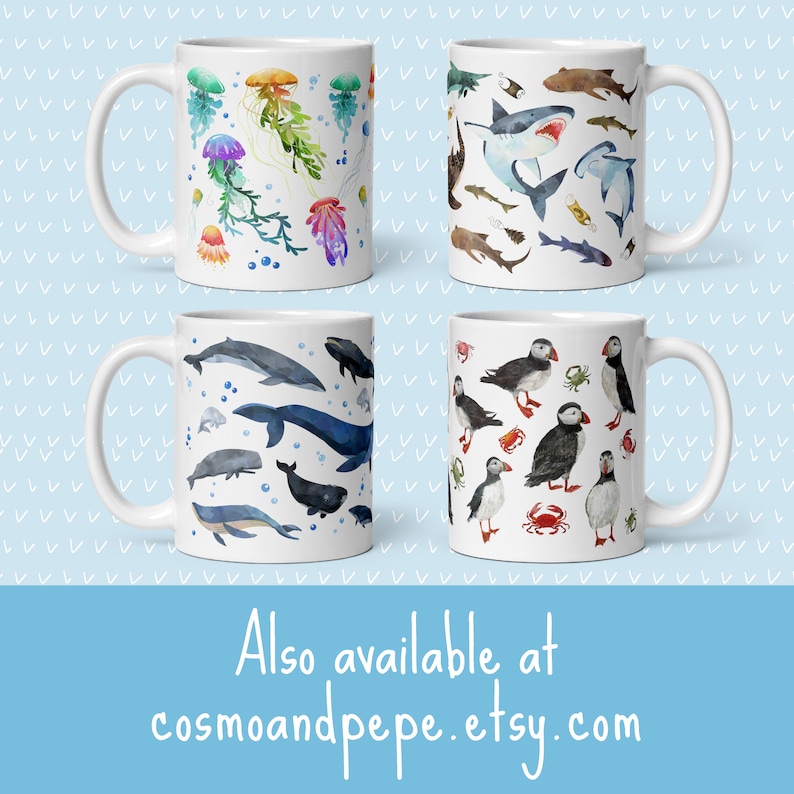 May include: Four white ceramic mugs with marine life designs. One mug features colorful jellyfish, another has sharks and fish, a third displays whales, and the last shows puffins and crabs. The text "Also available at cosmoandpepe.etsy.com" is at the bottom.