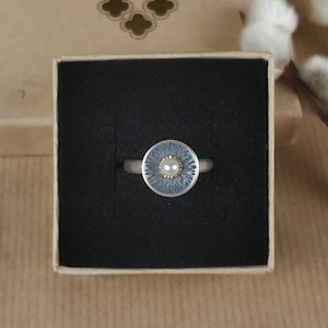 Ring with pearl