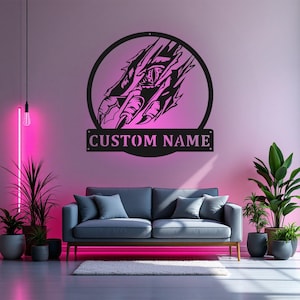 May include: Black metal wall art featuring a dragon claw with an eye, surrounded by a circle. The art includes a personalized nameplate with the text "CUSTOM NAME".