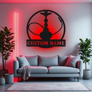 May include: Black metal wall art featuring a stylized hookah with a personalized nameplate that reads "CUSTOM NAME". The art is mounted on a wall with a red light shining behind it.