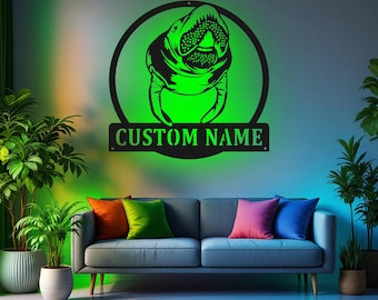 May include: A black metal wall sign with a green silhouette of a manatee in a circle. The sign has the text "CUSTOM NAME" below the manatee.