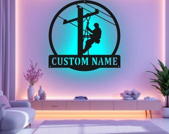 May include: A black metal silhouette of a person climbing a utility pole with the text "CUSTOM NAME" below. The silhouette is set against a blue and purple background.