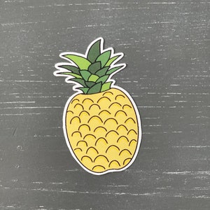 May include: A yellow pineapple with green leaves, drawn in a cartoon style. The pineapple is on a gray background.