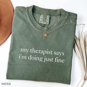 Comfort Colors Shirt My Therapist Says I’m Doing Just Fine, Funny Mental Health Shirt For Women, Sarcastic Gen Z Meme Tee, Healing Era Gift