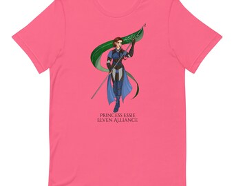 May include: A pink t-shirt featuring a graphic of a woman in blue armor holding a flag with green and white accents. The text "PRINCESS ESSIE ELVEN ALLIANCE" is printed below the graphic.