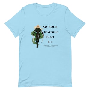 May include: Light blue t-shirt with a graphic of an elf holding swords and the text "My book boyfriend is an elf. Farrendel Laesoryn'sh Elven Alliance."