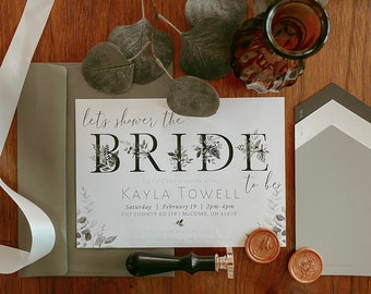 May include: A white card with black text and floral illustrations announcing a bridal shower for Kayla Towell. The text reads "Let's shower the BRIDE Kayla Towell to be. Please join us in honoring... Saturday, February 19, 2pm-4pm, 1717 County Rd 139, McComb, OH 45858."