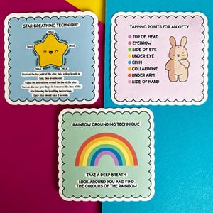 May include: Three square cards with scalloped edges. One card has a yellow star with the text "STAR BREATHING TECHNIQUE". Another card has a bunny illustration and the text "TAPPING POINTS FOR ANXIETY". The third card has a rainbow and the text "RAINBOW GROUNDING TECHNIQUE".