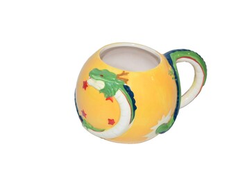 Dragon Ball Z mok met drakenhandvat en Shenron-figuur, alleen met craquelé-decoratie.