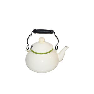 May include: White enamel teapot with a black handle and spout. The lid has a small knob and a green trim. The handle is black with a wooden grip. The teapot is a classic kitchenware item.
